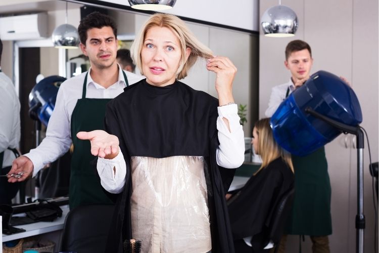 woman not happy with hairdresser services