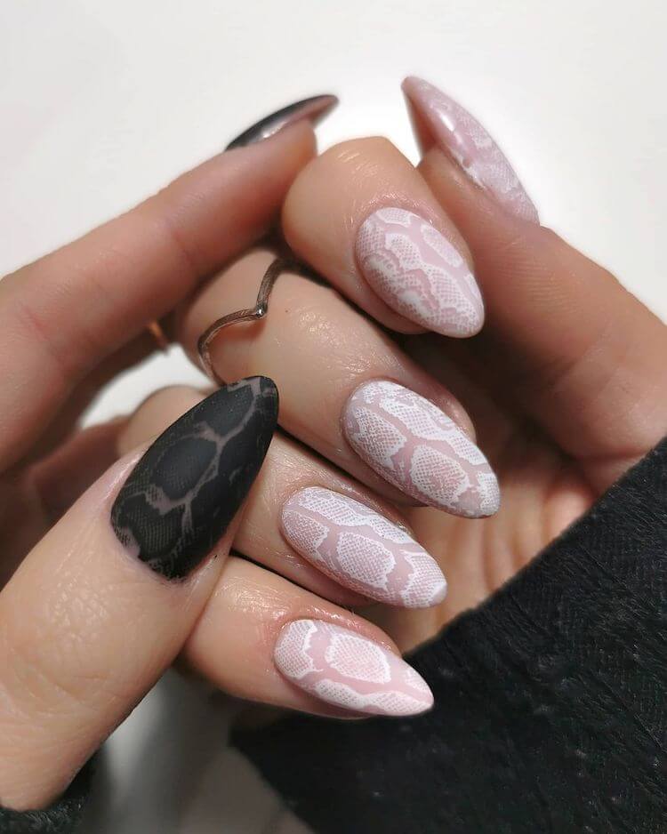 nude and black snake print nail trend