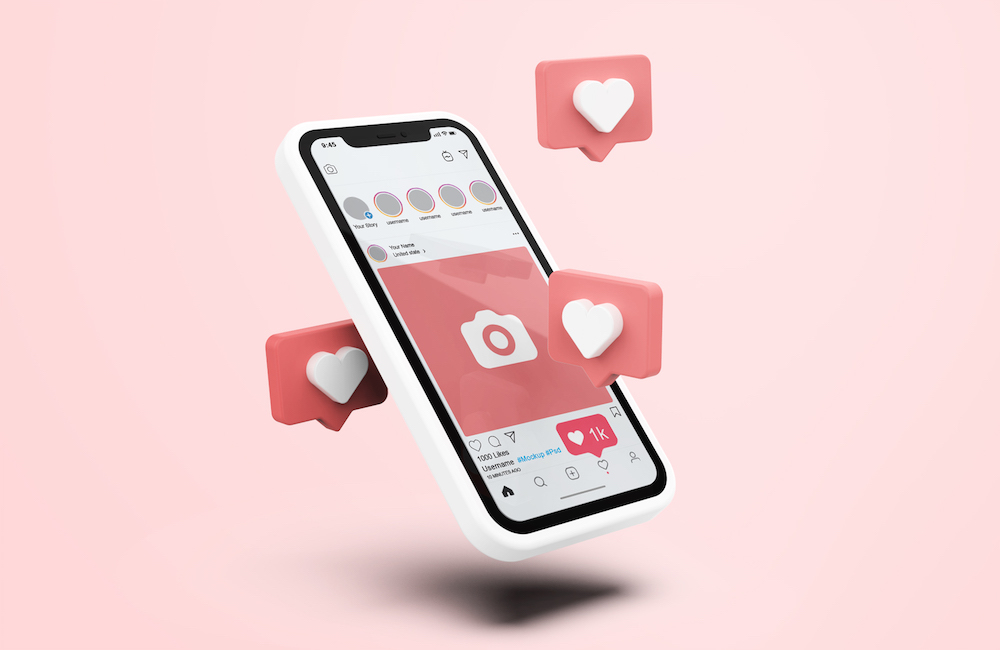 smartphone with hearts on instagram app