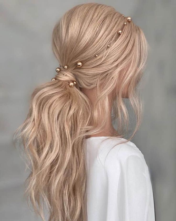 Low ponytail with golden accessories