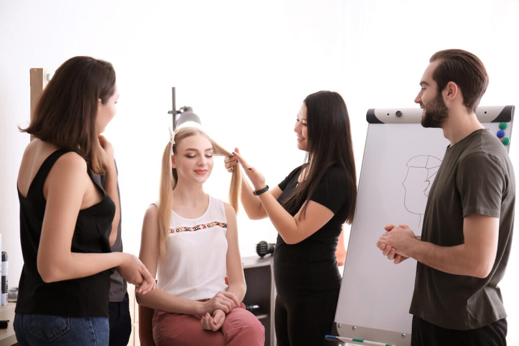 Beauty professionals attending a workshop demonstration